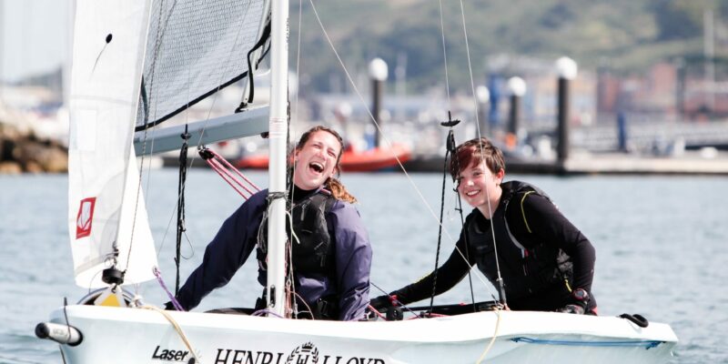 Two Young Women Take Part in a Dinghy Sailing Course